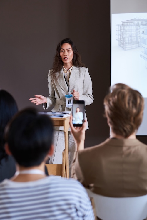 Woman speaking at a seminar